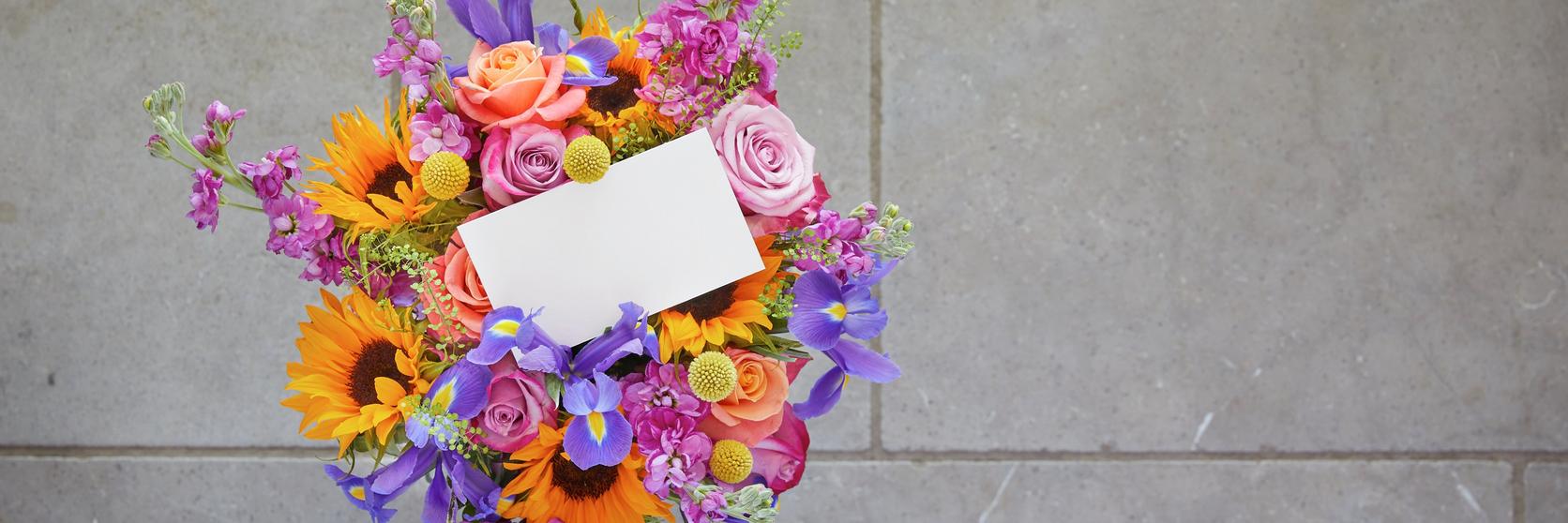 bright-bouquet-flowers-vase-on-path